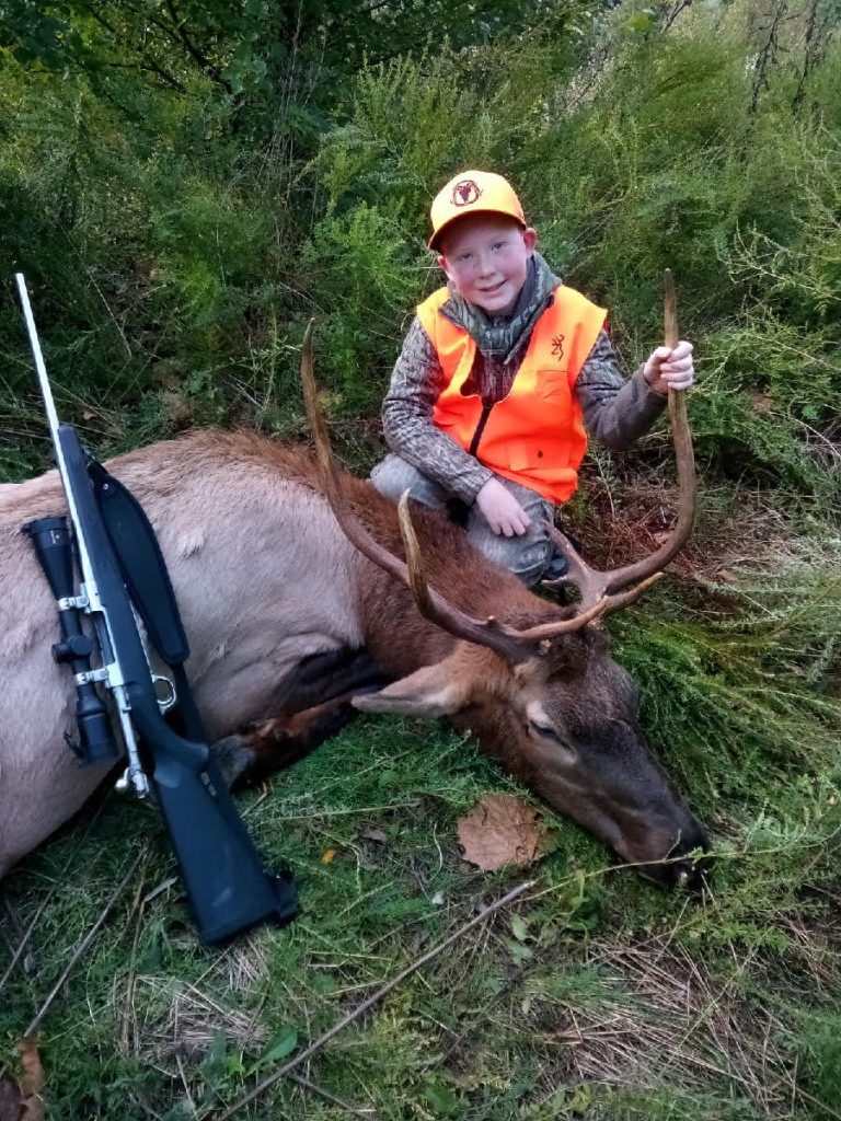 youth and his harvested elk