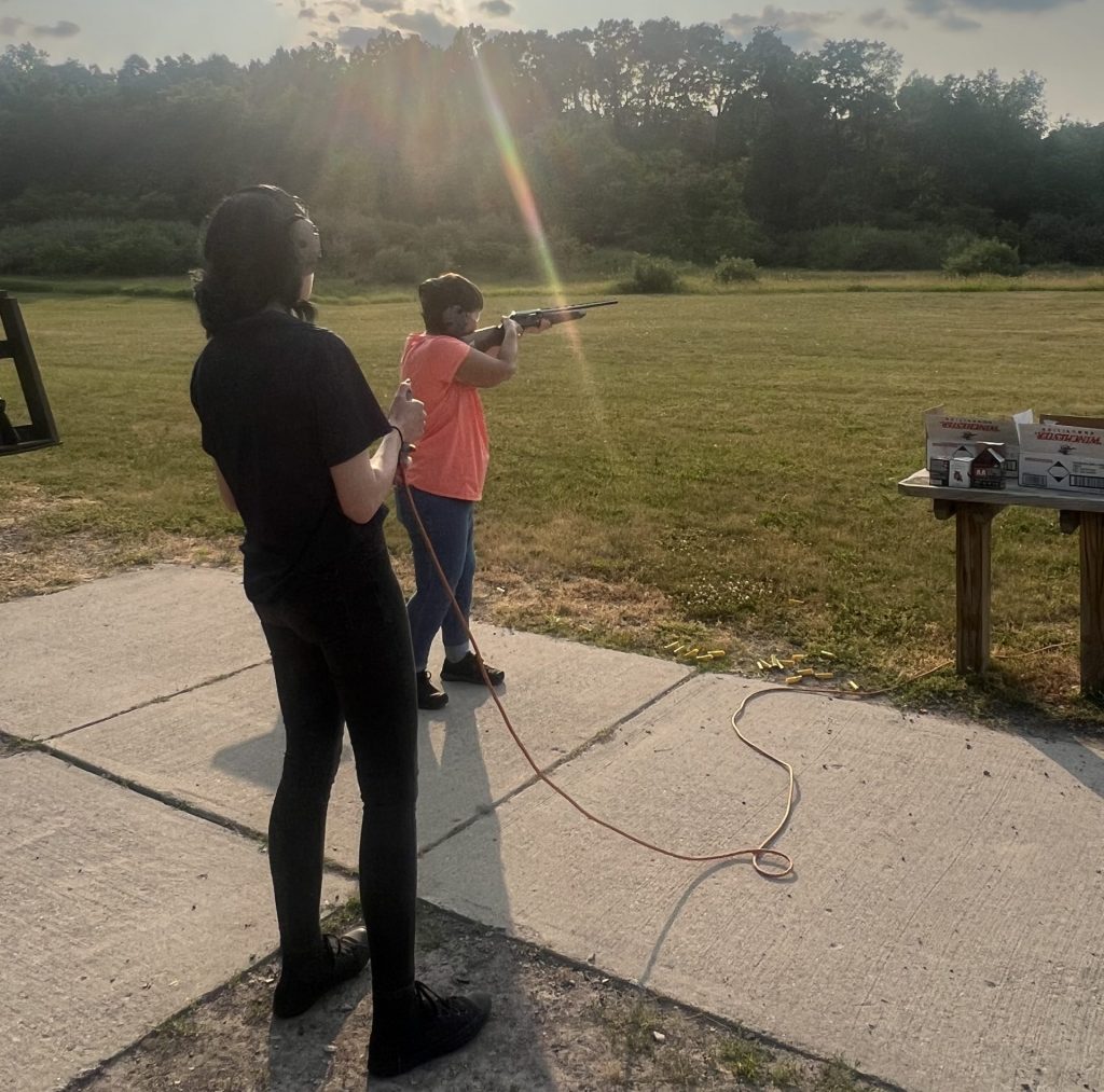 intern helps with shooting event