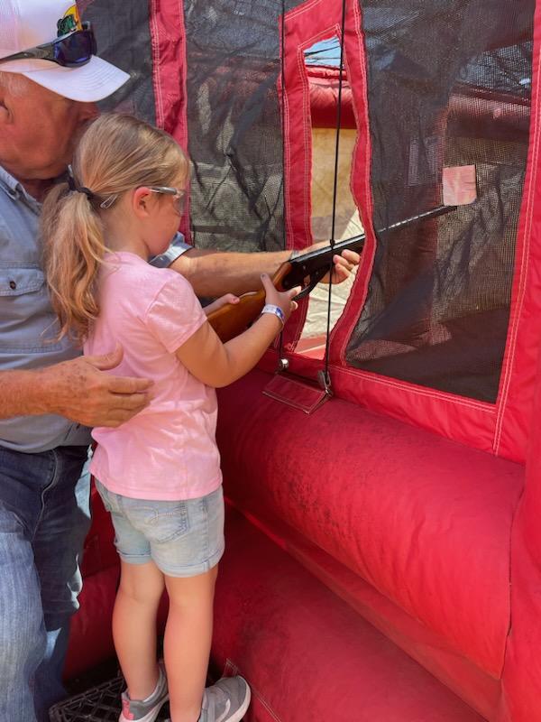 children learning to shoot bb guns