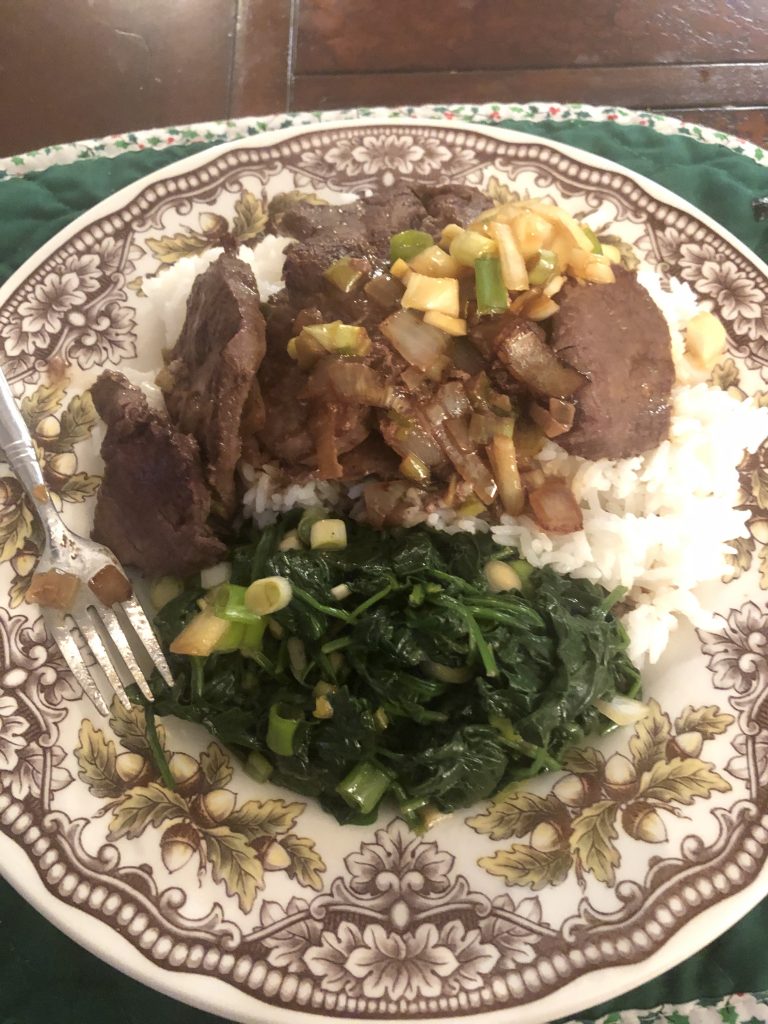 Korean Venison Dish plated up with rice and side of greens