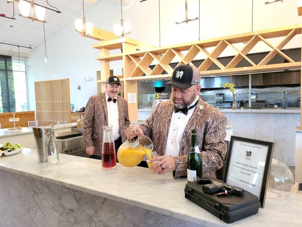 Two men bartender at the event
