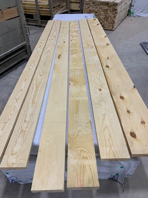Finished Product: Ponderosa pine boards milled from the Colt Project. Photo courtesy of Devils Tower Forest Products.