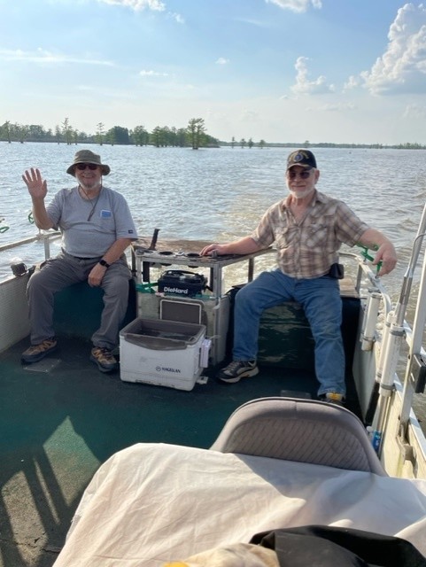 two veterans on a boat