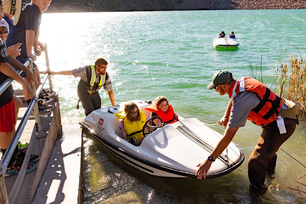 Sudent boat around the Cold Brook Reservoir