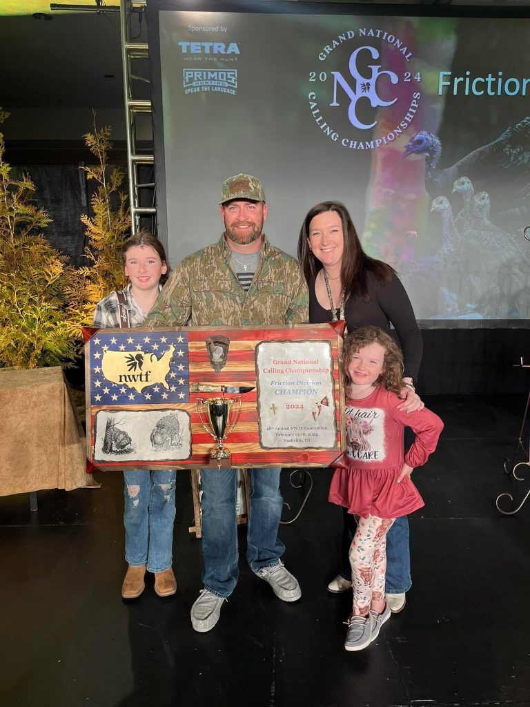 Dylan Bearden poses with his family after the GNCC.