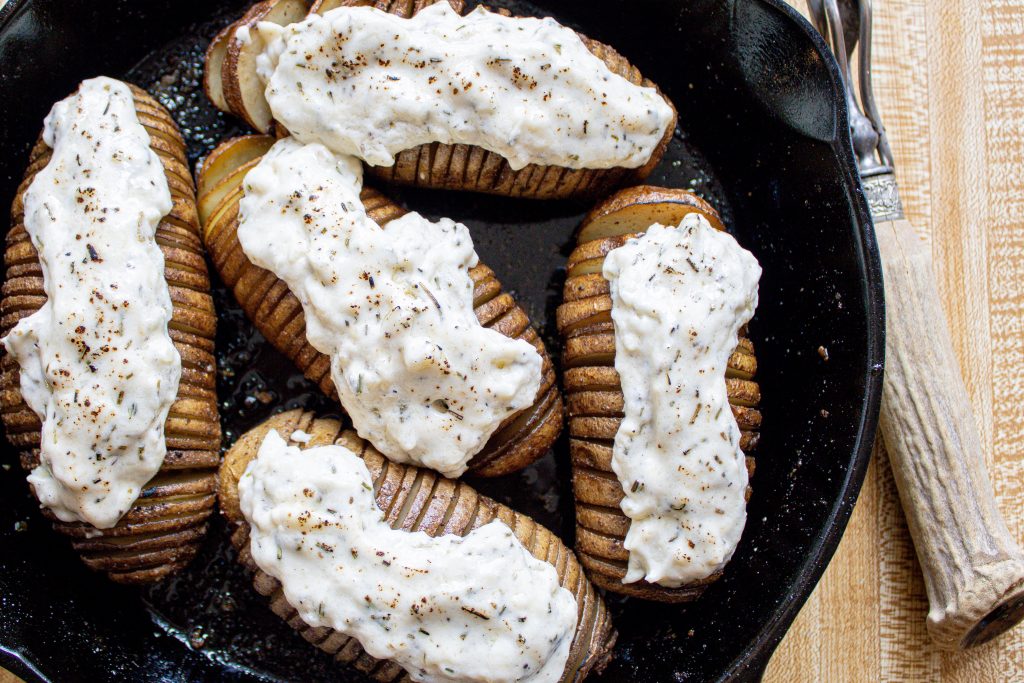 Smoked Hasselback Potatoes w Rosemary Garlic Crema