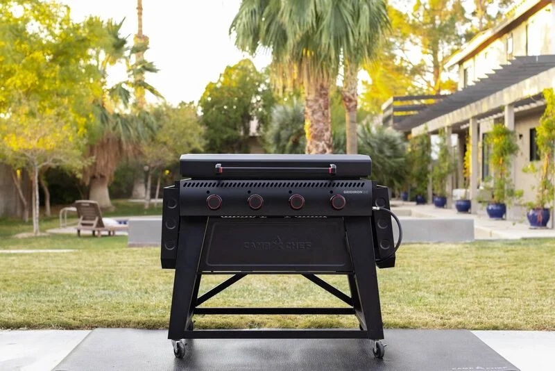 Camp Chef Grid Iron grill in a backyard