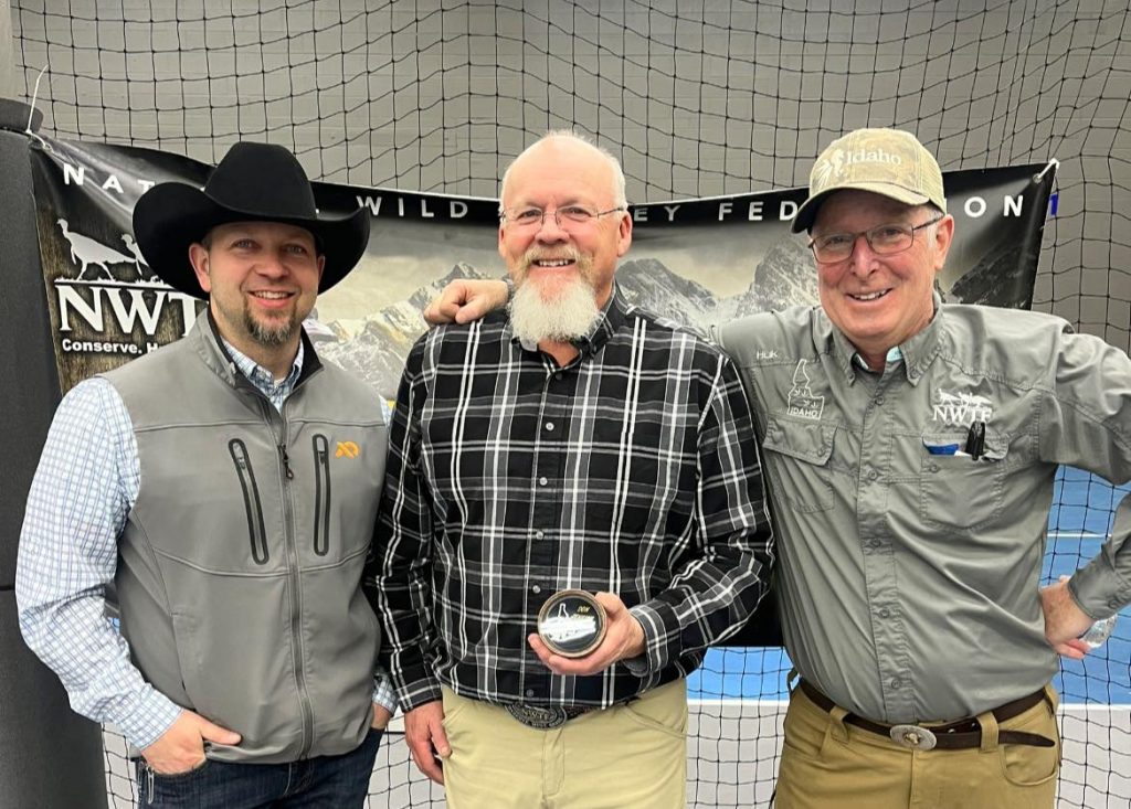 Don Jenkins with his custom turkey call award