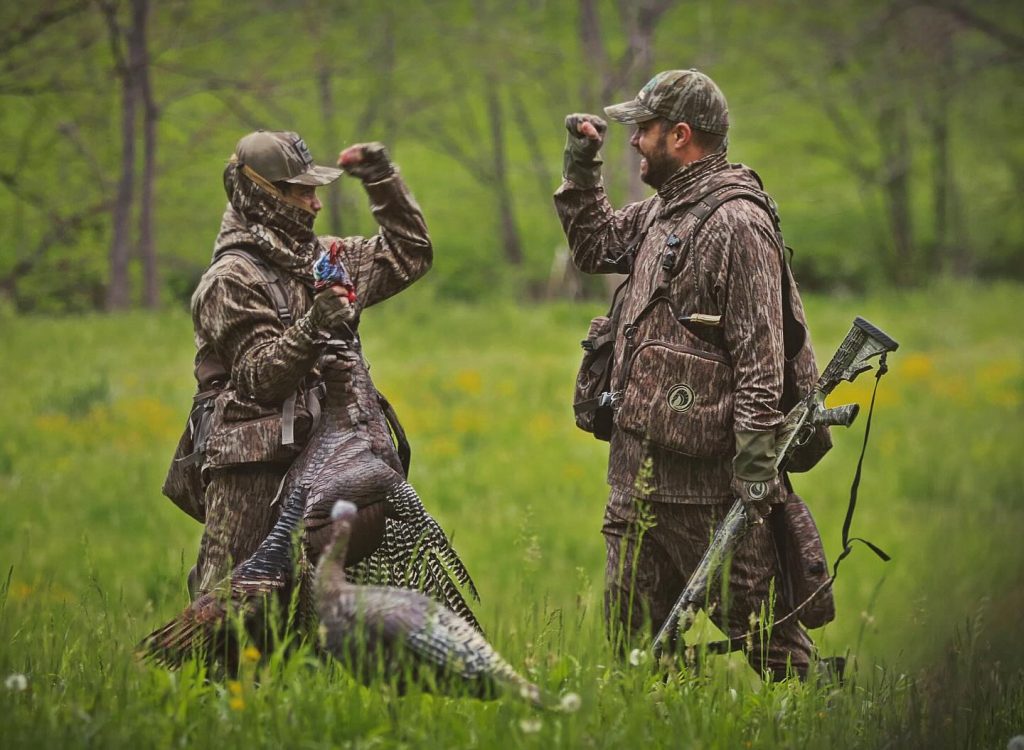 Hunters celebrate a successful hunt. 