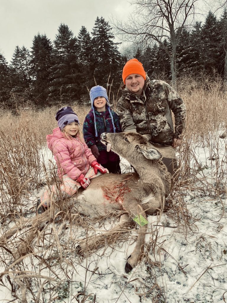 Brandon Nutt with harvested deer