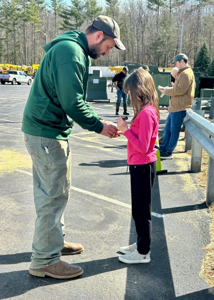 Hamel's granddaughter practicing using a turkey call