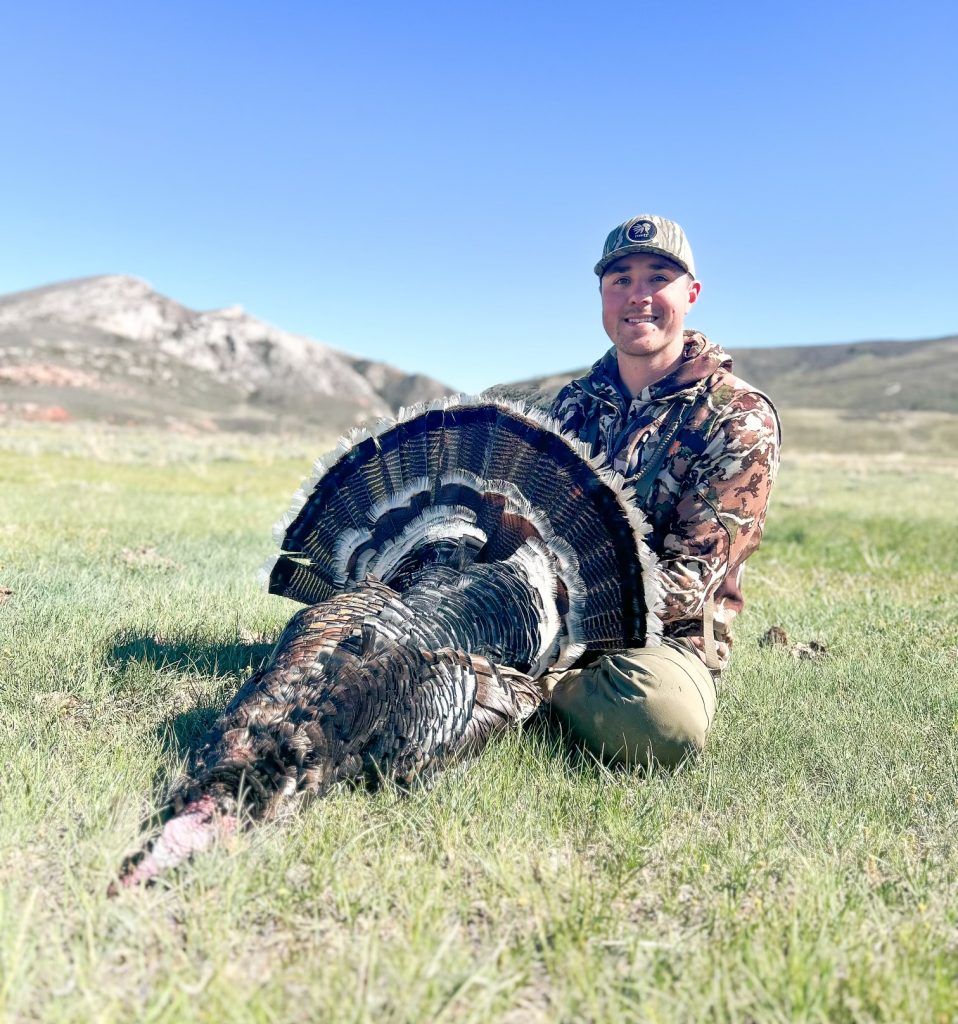 Trevor Day with harvested turkey