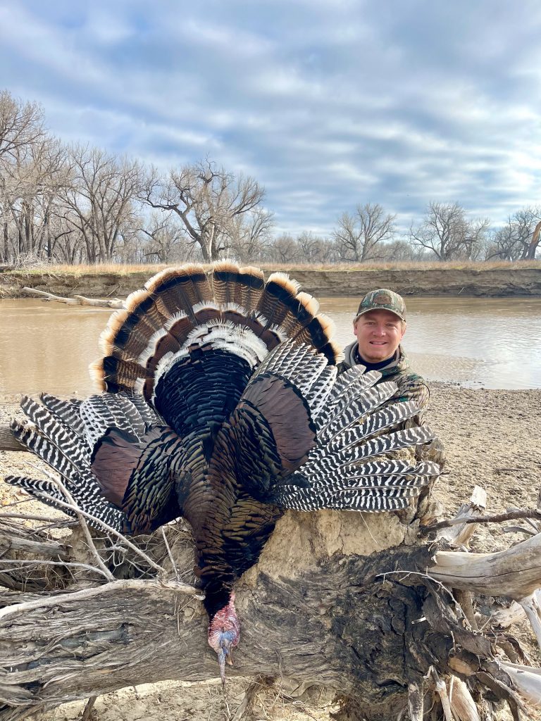 Dillon Williams with harvested turkey