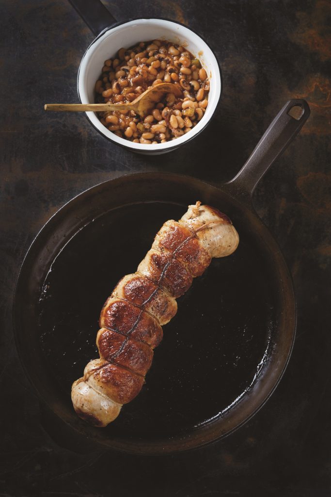 Cornbread-and-Sweet Pepper-Stuffed Turkey Breast with a side of black-eyed pea stew.