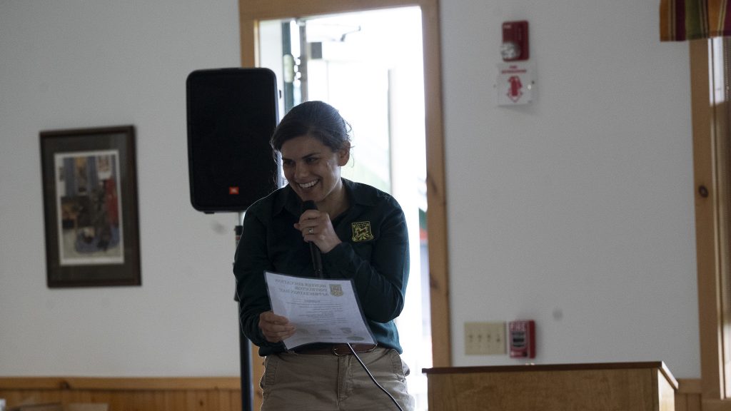 Nicole reading off award winners