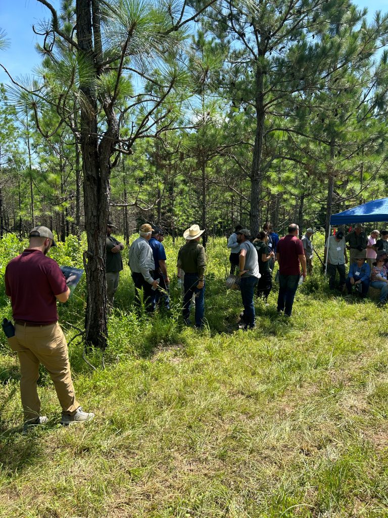 Attendees visit habitat site.