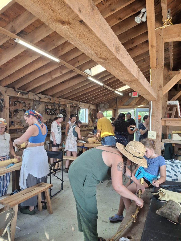 Attendees participate in an earthcraft workshop