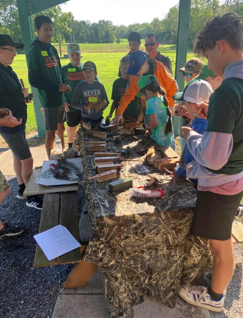 Youth working with box calls.