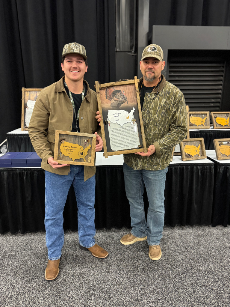 Clay and his Dad at NWTF Show.
