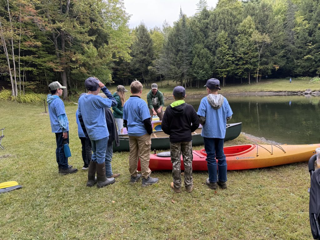 Youth at the kayak station