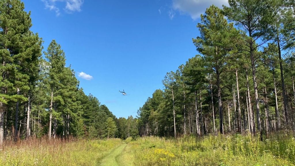 Helicopter flies over Mattaponi WMA.