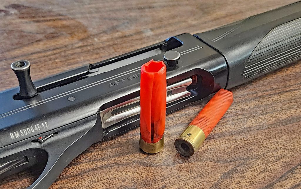 Damaged 28-gauge shotshells with the 20-gauge shotgun.