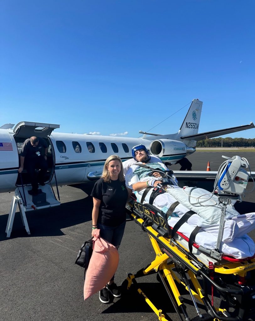 Carson and his mom before the flight to the facility in Georgia